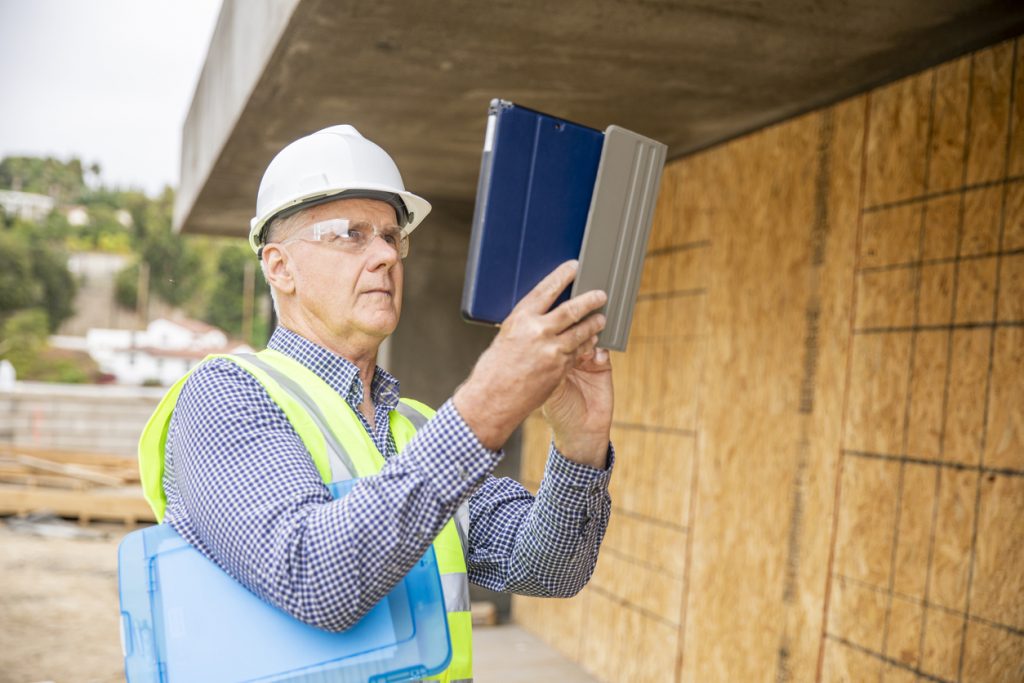 contractor taking a photo of work